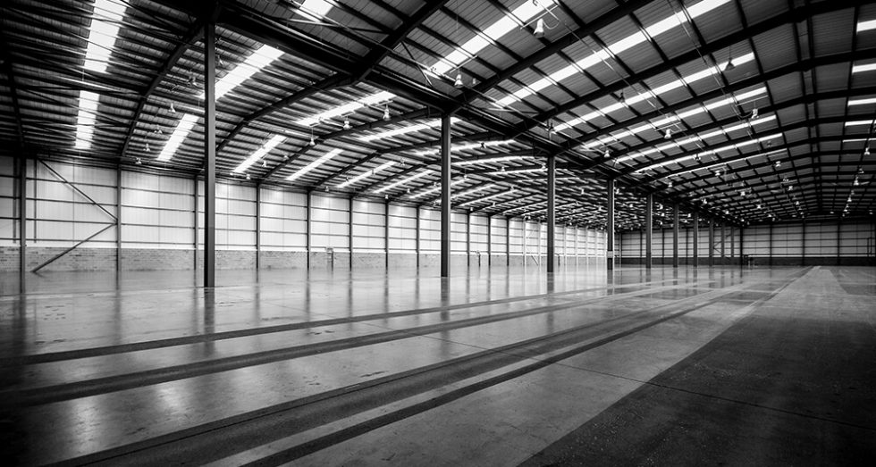 Large industrial space. Big empty logistics shed