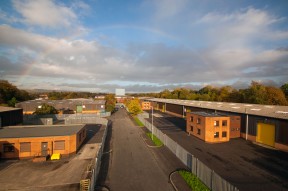 Royle Penine Industrial Estate Rochdale warehouse buildings sunset rainbow