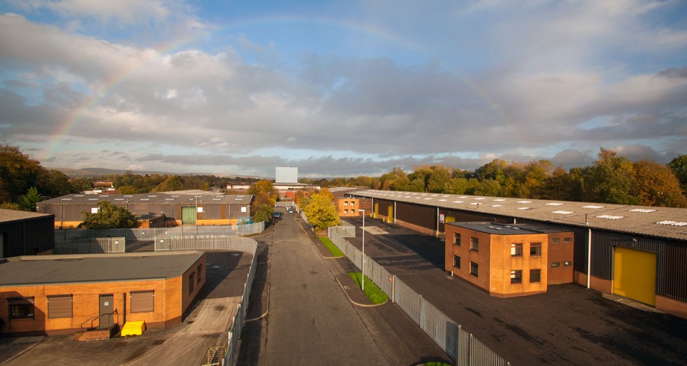 Royle Penine Industrial Estate Rochdale warehouse buildings sunset rainbow