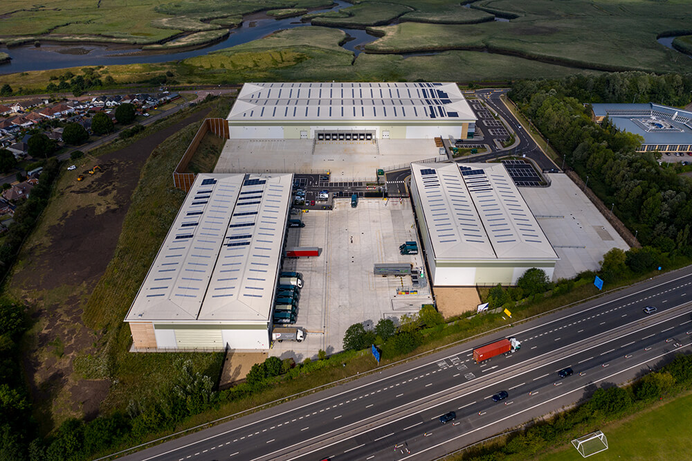 Drone shot of logistics hub by motorway in Southampton